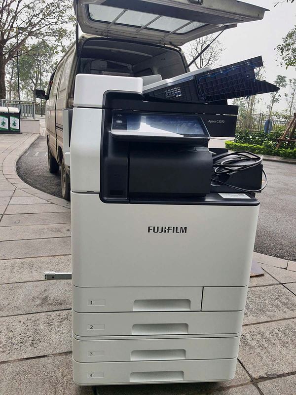 Xe chở máy photocopy Apeos C3070 đến địa điểm khách hàng